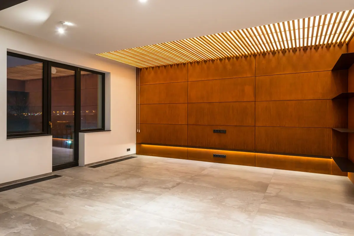 Interior with a warm timber slat ceiling and concealed lighting